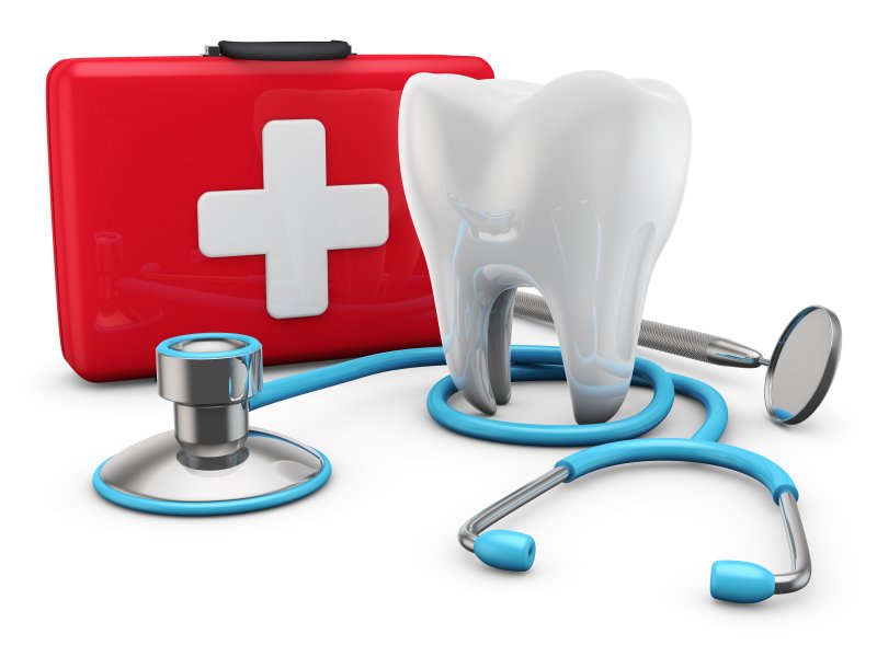 Tooth, stethoscope, and dental emergency kit